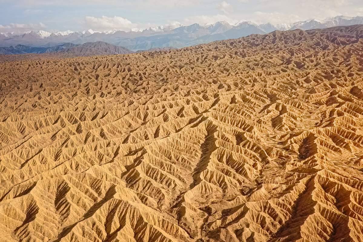 Aksai Canyon — red clay ridges near Almaty, Kazakhstan