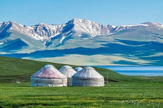 Son-Kol alpine lake with nomad yurts at 3,000 m, Kyrgyzstan